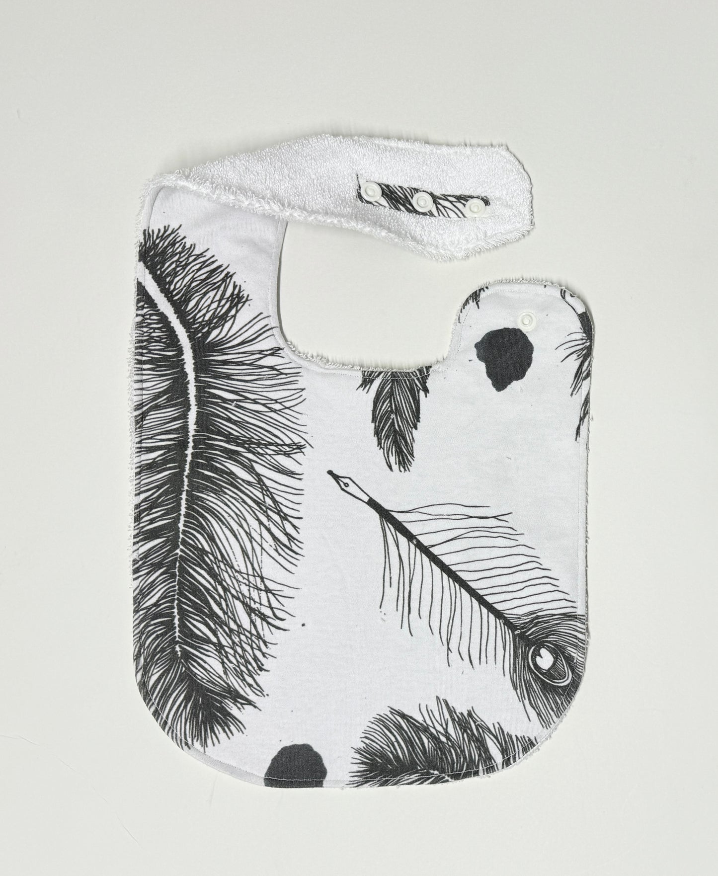 Monochrome Feathers Organic Cotton Feeding Bib